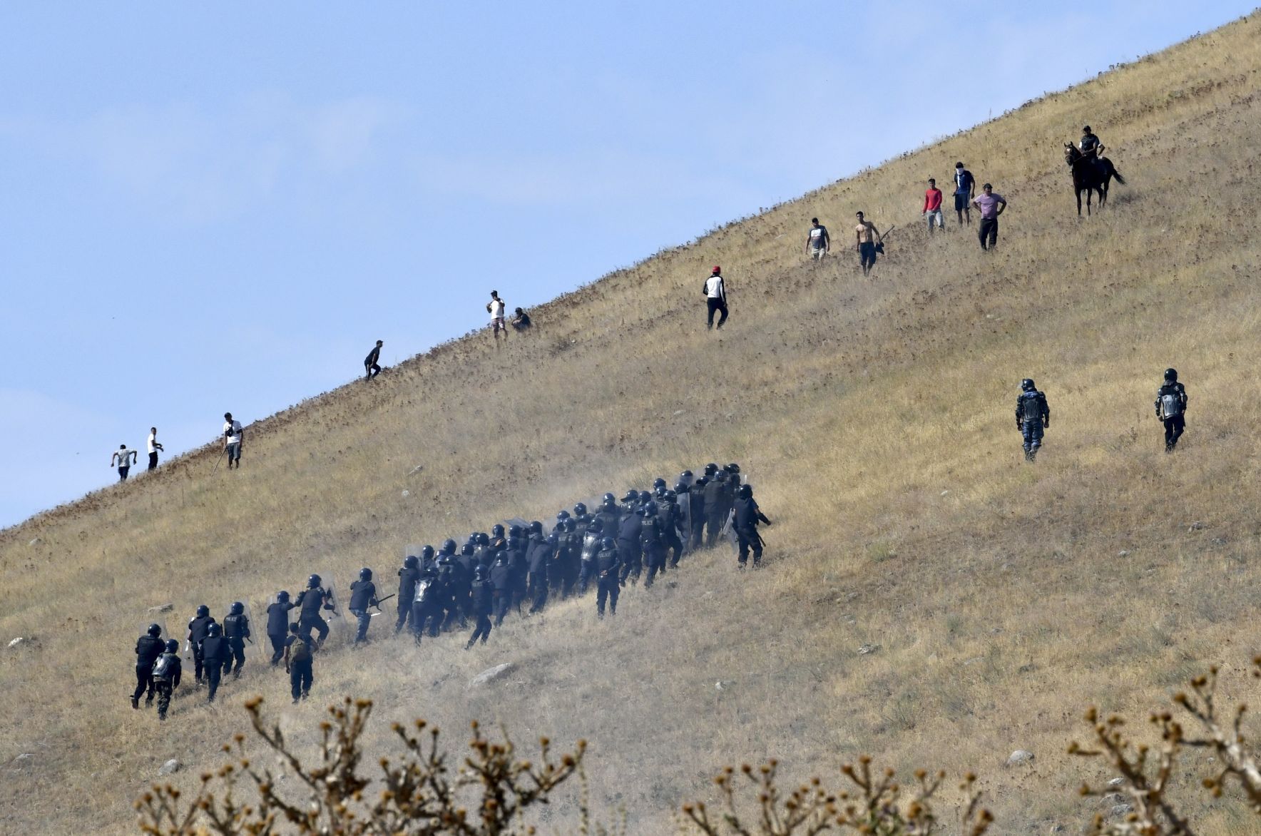 APTOPIX Kyrgyzstan Raid